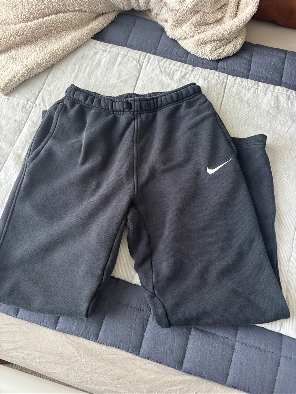 Nike Kids Black Sweatpants with White Swoosh